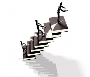 learning - figures climbing books