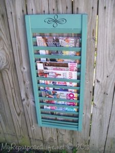 diy magazine storage from a shutter