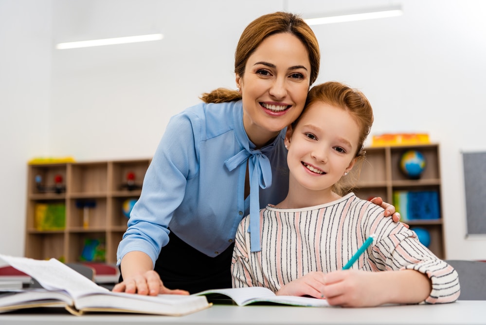 teacher with student