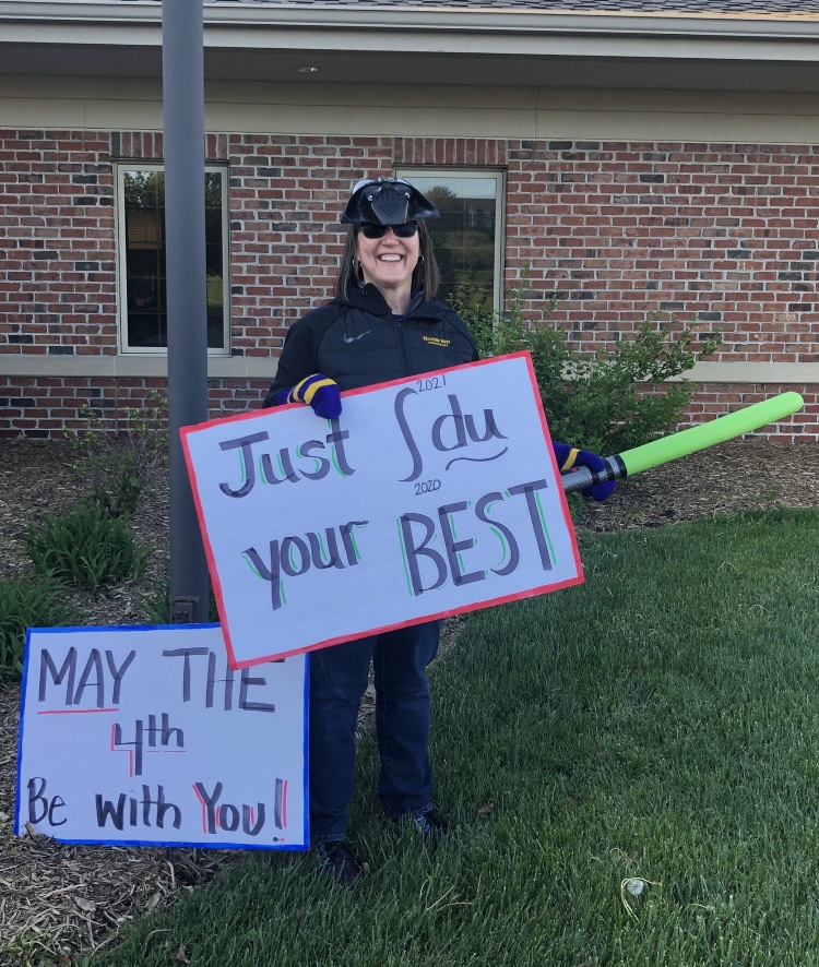 female teacher with calculus signs