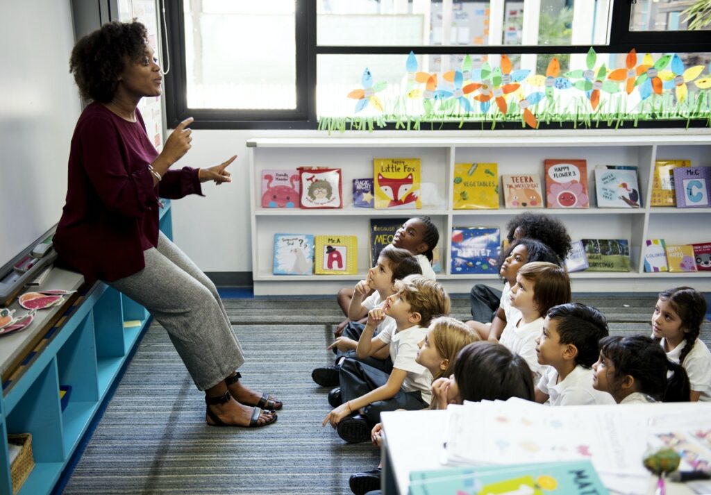 female teacher in front of class