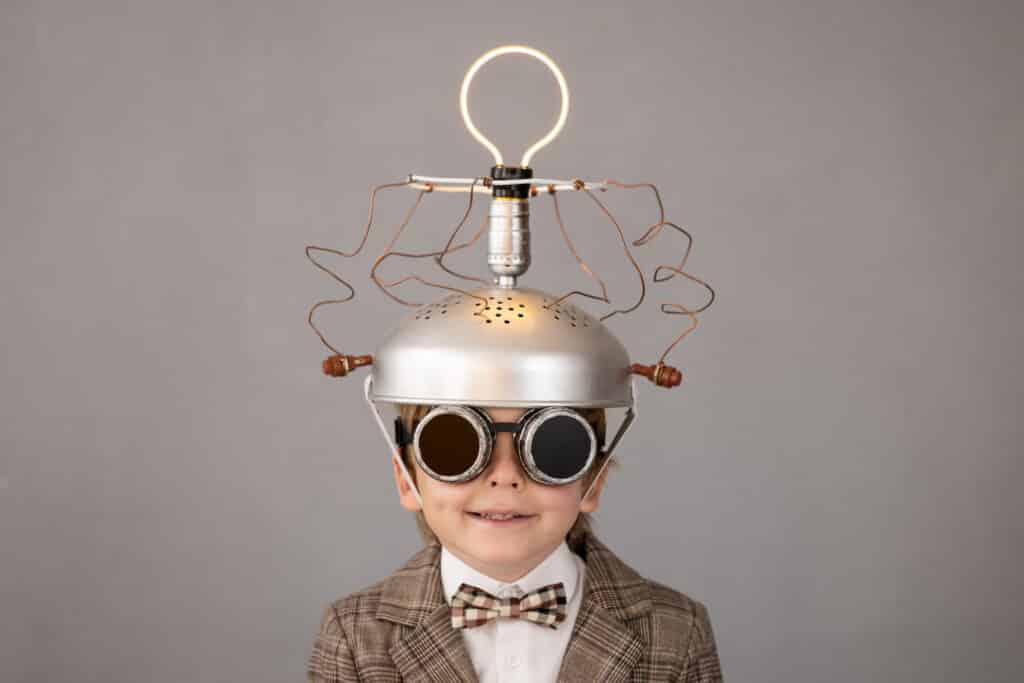boy in suit with crazy contraption on head