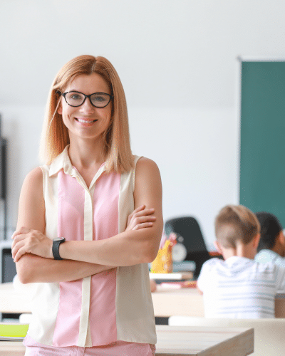 female teacher in back of class